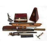 A Sikes Hydrometer, boxed; together with a German metronome; and a selection of antique tools.