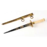 An early 19th century French stiletto dagger with blue & gilt tapering blade, turned ivory handle in