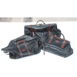 A graduated set of Bugatti style leather luggage with lacquered brass fittings, the largest approx