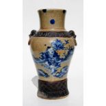 A 19th century Chinese crackle glaze vase decorated in underglaze blue a figure in a landscape
