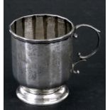 A silver christening tankard, Birmingham 1929, weight 95g, 8cms (3.1ins) high.