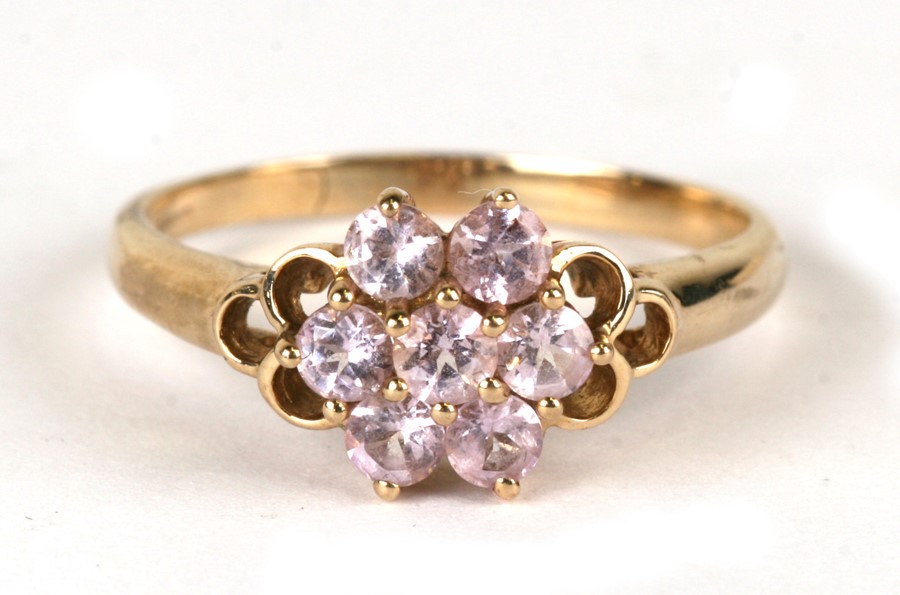 A 9ct gold pink stone cluster ring, weight 2.6g, approx UK size 'Q'.