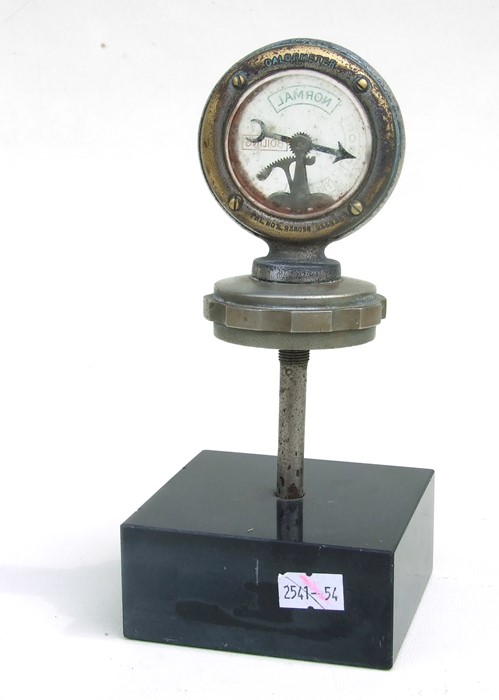 A Wilmot Calometer on a radiator cap mounted on a plinth. - Image 2 of 2