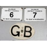 A Salisbury District Council enamel taxi licence plaque, No. 6 To Seat 4 Passengers, 10 by 15cms (