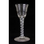 An 18th century wine glass with double helix ait twist stem, 14cms (5.5ins) high.Condition Report