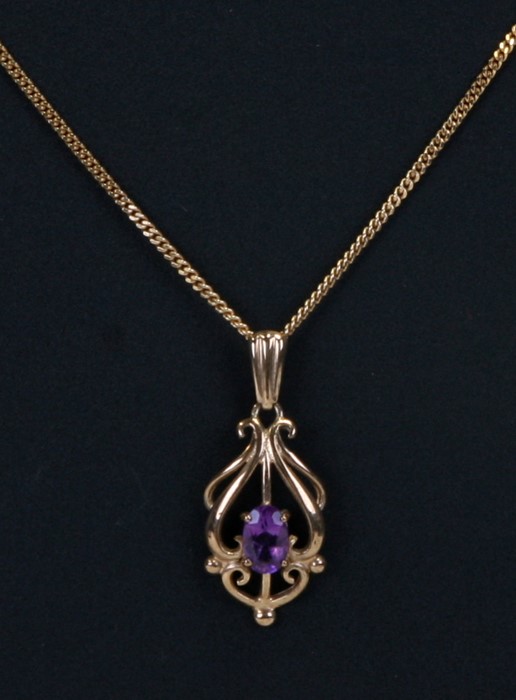 A 9ct gold amethyst set pendant on a 9ct gold chain, weight 3.7g.