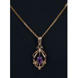 A 9ct gold amethyst set pendant on a 9ct gold chain, weight 3.7g.