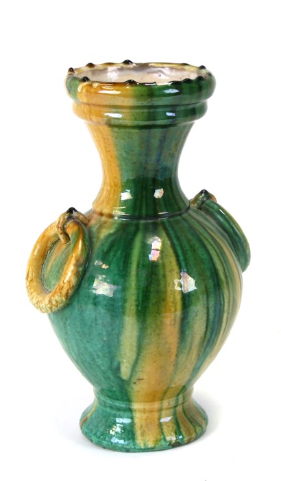 A Chinese sancai glazed vase with two ring handles, 30cms (12ins) high.
