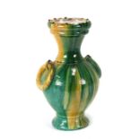 A Chinese sancai glazed vase with two ring handles, 30cms (12ins) high.