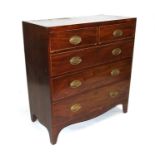 A 19th century mahogany chest of two short and three graduated long drawers, on splay bracket