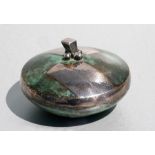 A Loys Lucha, Paris Art Deco silvered & Verdigris bronze patinated circular powder puff box and