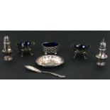 A pair of Edwardian silver salts with blue glass liners, Birmingham 1904; together with a silver