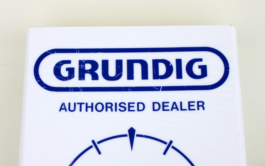 An original GRUNDIG authorised dealer electric wall clock, 30cm (12 ins) wide - Image 2 of 2