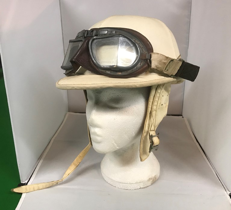 A Chas Owen & Co (Bow) Ltd Skulgarde? crash helmet, with RAF Mk VIII goggles (2)