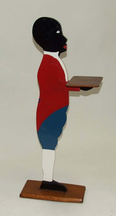 A painted wooden Blackamore, 95cms (37.5ins) high.