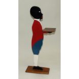 A painted wooden Blackamore, 95cms (37.5ins) high.