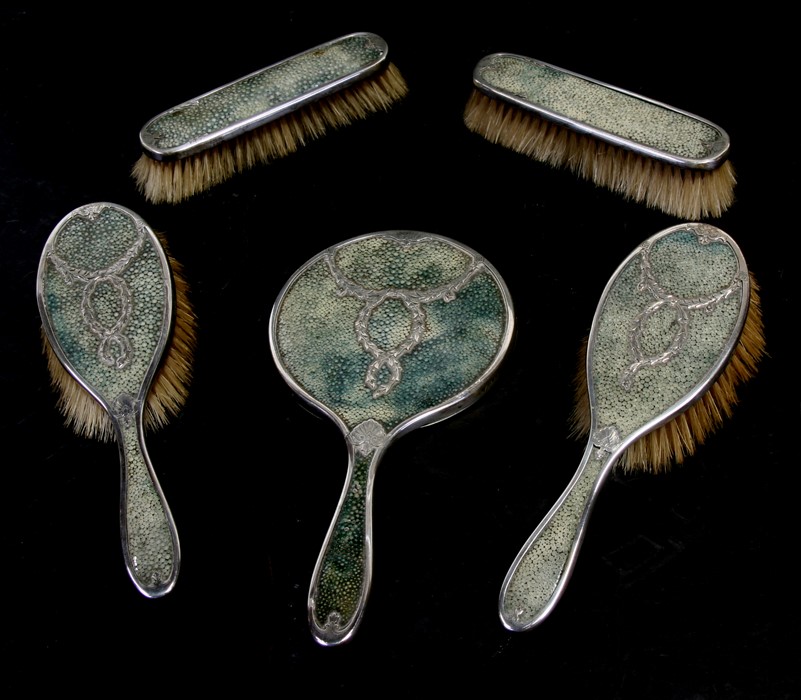 An early 20th century silver & shagreen five-piece dressing table set, London 1926 (5).