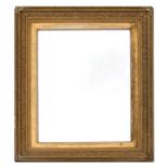 A gilt framed wall mirror, 57 by 84cms (26.5 by 33ins).