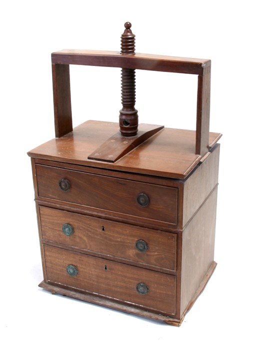 An 18th / 19th century mahogany linen/book press chest, the rectangular press with turned thread