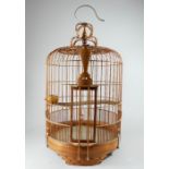 Two Chinese carved wooden birdcages. 50cm 19.75 ins) high