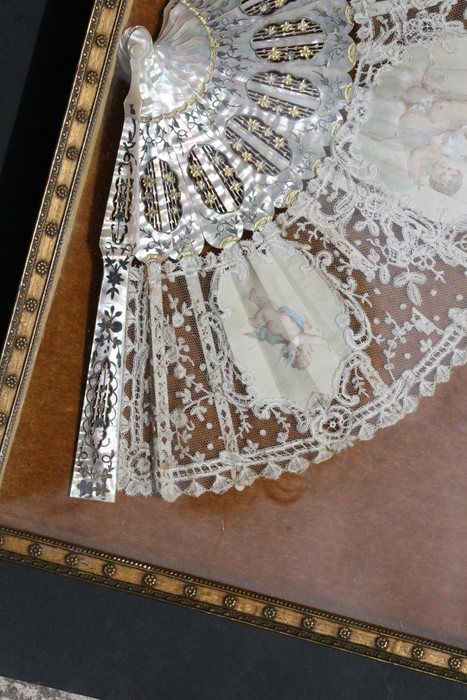 A 19th century fan with mother of pearl sticks and lace leaf decorated with three vignettes with - Image 3 of 7