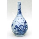 A large Chinese blue & white bottle vase decorated with a pair of birds amongst foliage, 41cms (