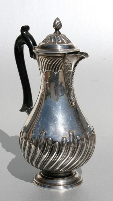 A Victorian silver water jug, London 1888, total weight 450g, 25cms (9.75ins) high.