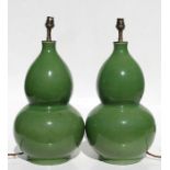 A pair of Chinese green crackle glaze double gourd vases converted to lamps, 42cms (16.5ins) high.