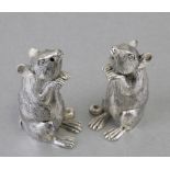 A pair of novelty silver plated salt and pepper pots in the form of mice, 5cms (2ins) high; together