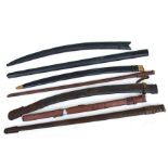 Seven leather Military sword scabbards. The longest is 85.5cms (33.625ins)