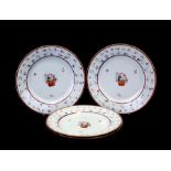 A set of four 18th century Chinese export famille rose plates, 24cms (9.5ins) diameter (4).