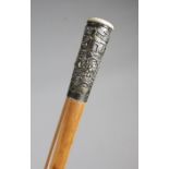 A Chinese silver & ivory handled walking cane, the silver mount decorated with figures, a