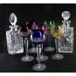 A set of six Bohemian flashed glass hock glasses; together with a pair of decanters (8).Condition