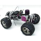 A HPI 1-5 scale racing buggy chassis with single cylinder engine, approx 52cms (20.5ins) long.