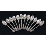 A set of twelve silver teaspoons, Walker & Hall Sheffield 1927, weight 107g (12).