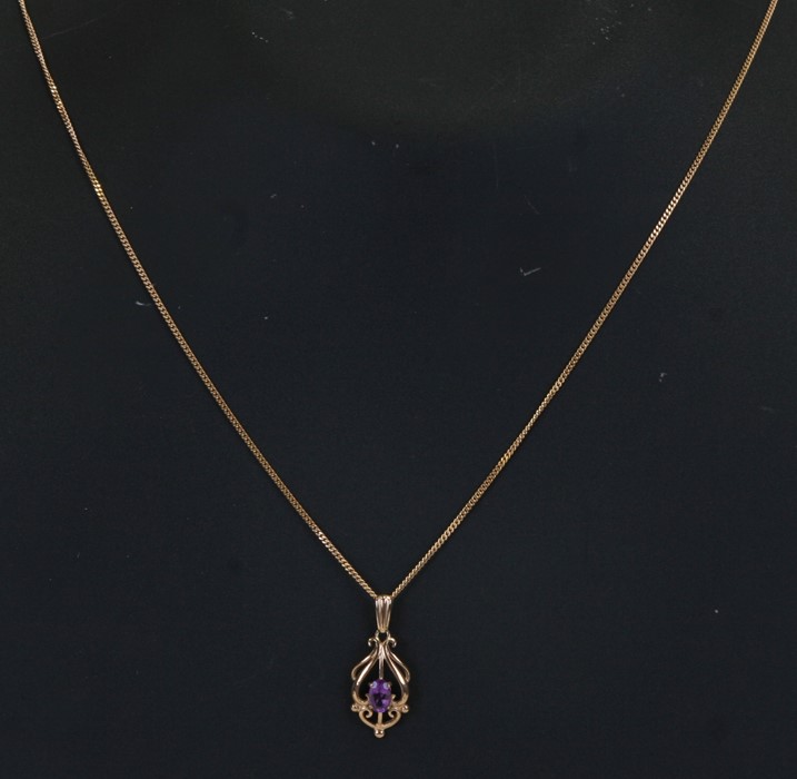 A 9ct gold amethyst set pendant on a 9ct gold chain, weight 3.7g. - Image 2 of 2