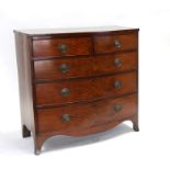 A 19th century mahogany bowfront chest of two short and three long drawers, on ogee bracket feet,