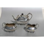 An Edwardian three-piece tea set, Sheffield 1903, total weight 986g.Condition ReportGood overall