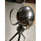 An A pillar chrome bodied spot lamp, approx. 12cm, (4 ins) diameter, on tripod base, overall