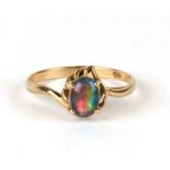 A 9ct gold ring set with an opal doublet, weight 1.6g, approx UK size 'N'.