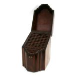 A George III mahogany knife box of serpentine fronted form with fitted interior, 23cms (9ins) wide.