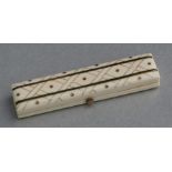 A George III ivory toothpick case with yellow metal inlaid decoration, 8cms (3.1ins) wide.