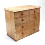 A Victorian stripped pine chest of two short and three graduated long drawers, 103cms (40.5ins)