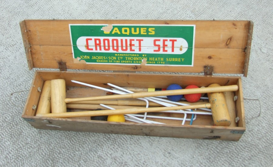 A boxed Jacques croquet set.