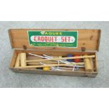 A boxed Jacques croquet set.