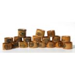 A collection of Victorian Mauchline ware napkin rings.
