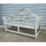 A well weathered teak Lutyen style garden bench, 170cms (67ins) wide.