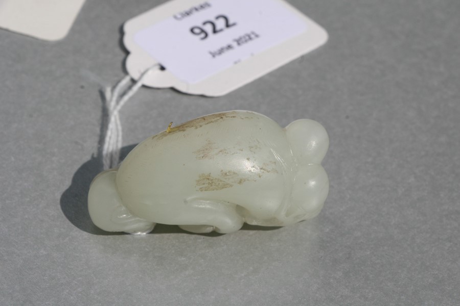 A Chinese jade figure in the form of a monkey holding a fruit, on an associated hardwood stand, 5cms - Image 7 of 9