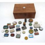 A Victorian mahogany box with shield shaped silver coloured metal plaque dated 1883 containing