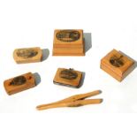 A collection of Victorian Mauchline ware to include vesta cases, glove stretchers and boxes.